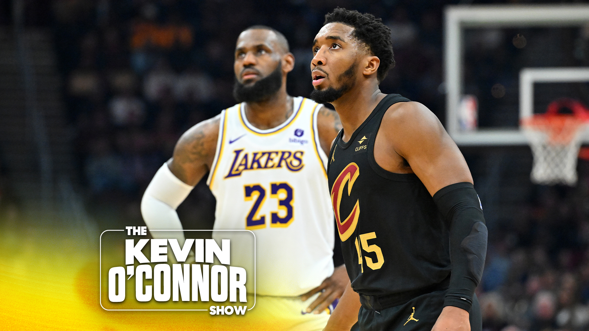 CLEVELAND, OHIO - NOVEMBER 25: Donovan Mitchell #45 of the Cleveland Cavaliers and LeBron James #23 of the Los Angeles Lakers wait for a free throw during the first quarter at Rocket Mortgage Fieldhouse on November 25, 2023 in Cleveland, Ohio. (Photo by Jason Miller/Getty Images)