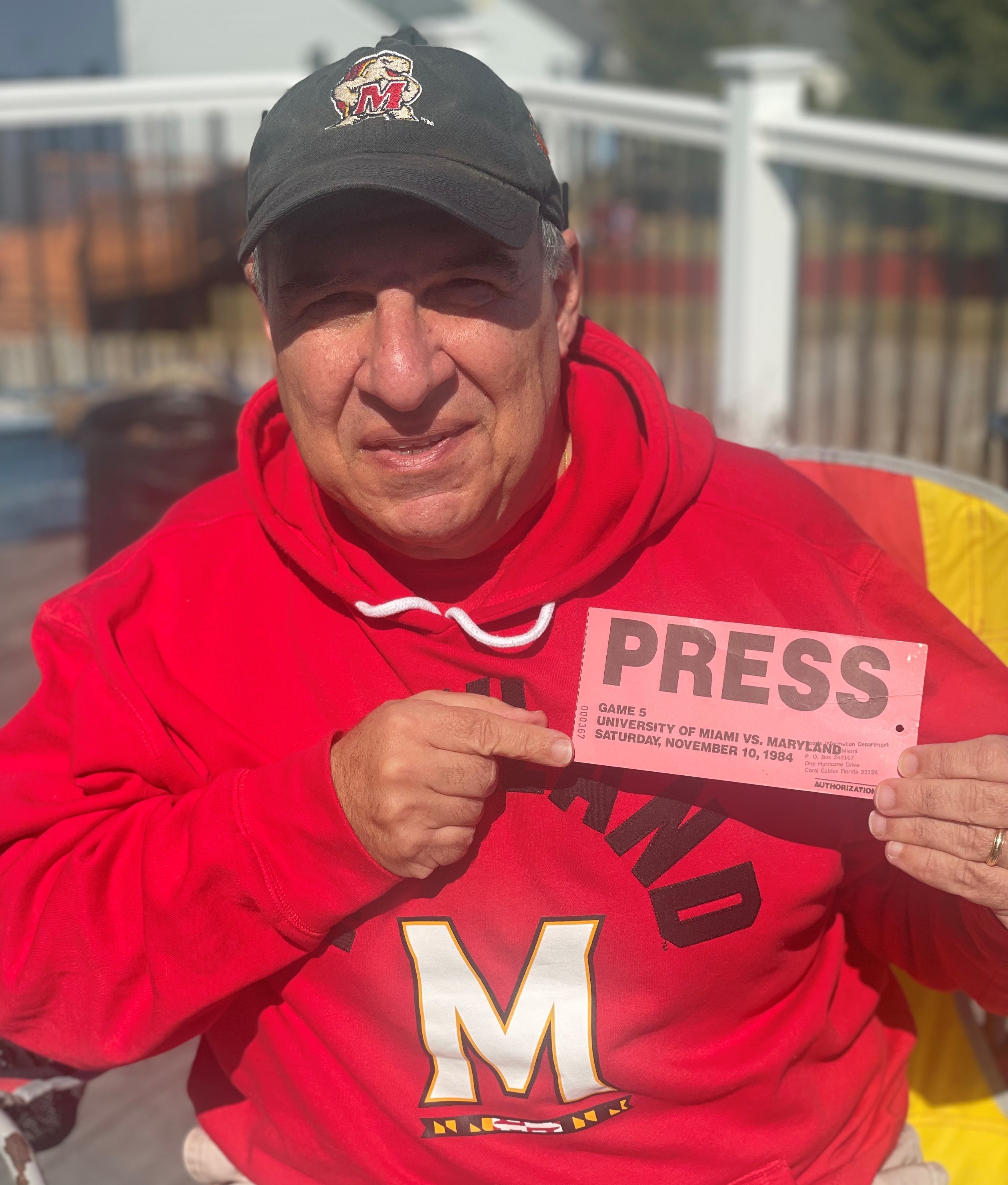 Paul with his old press pass.