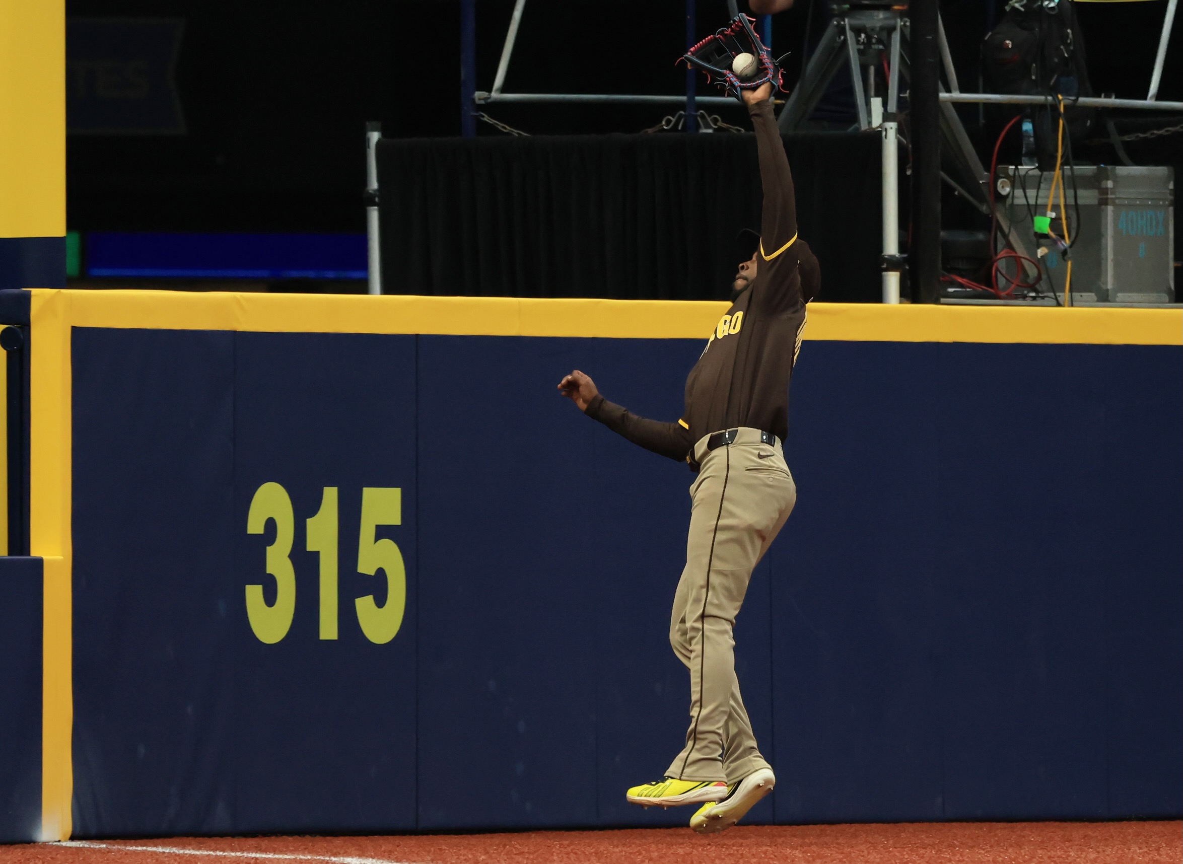 Padres lose to Rays in brutal fashion after drop of would-be game-inning out over the wall for home run