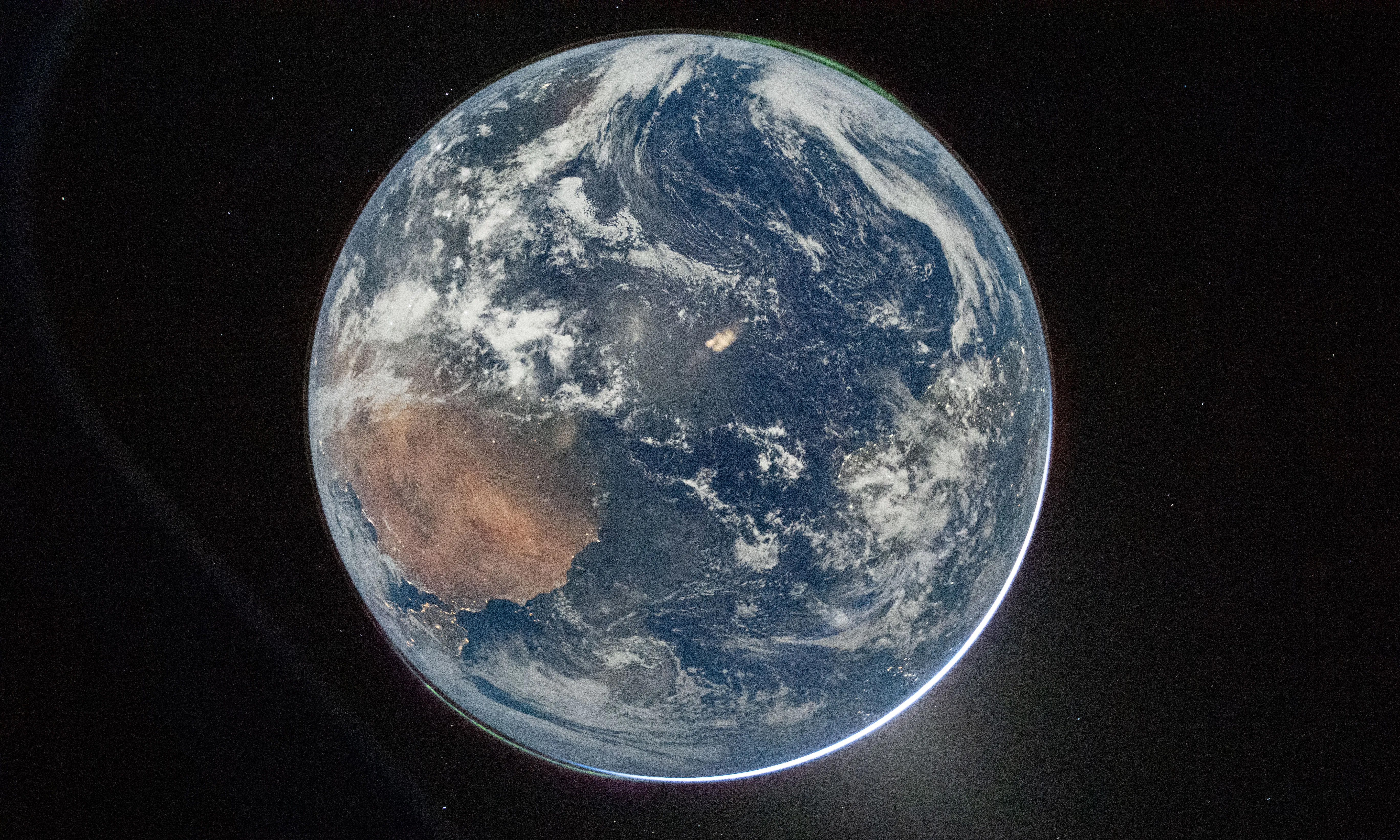 The Artemis II crew snapped some mesmerizing photos of Earth