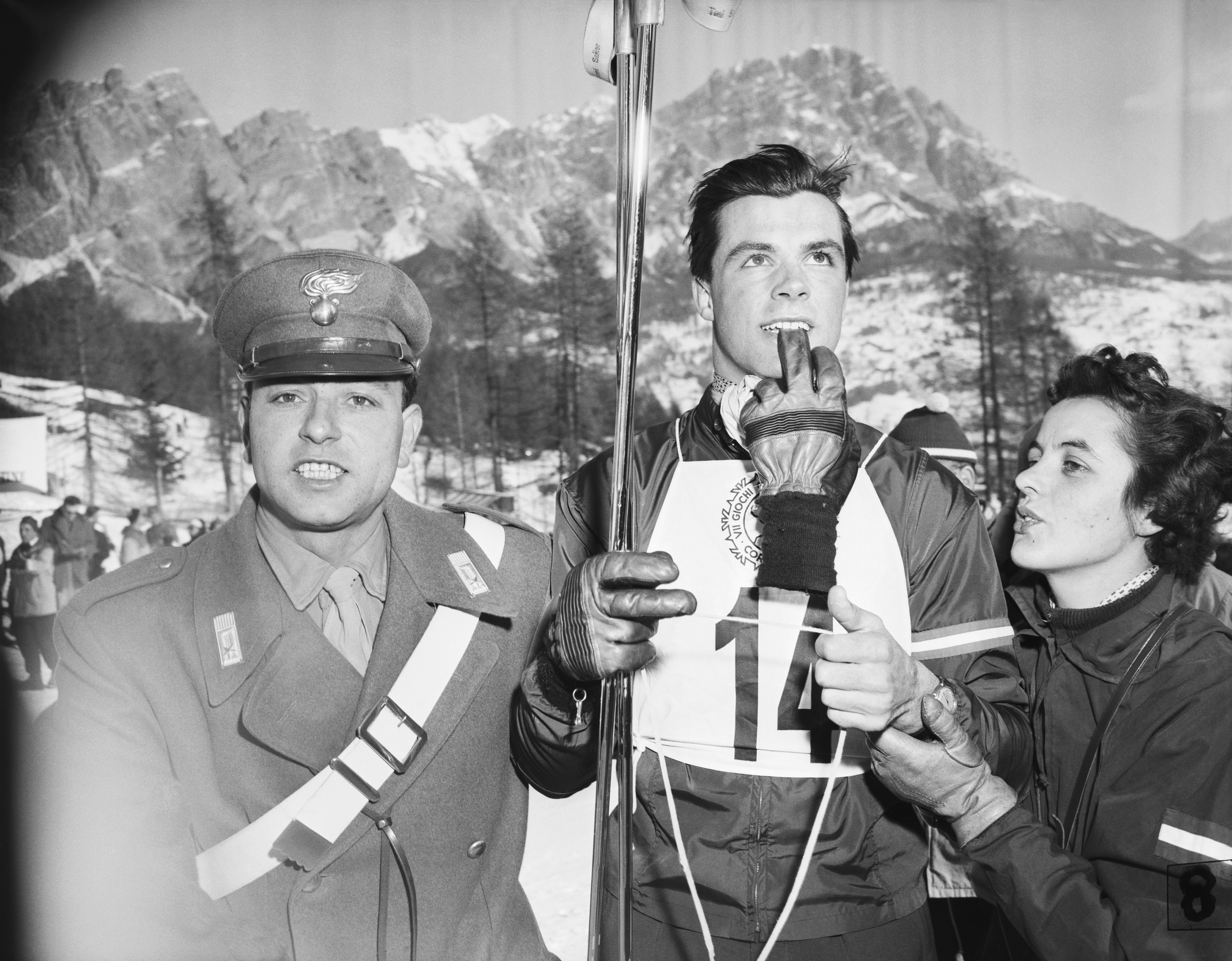 Sailer stands with his sister, Rosl, and a soldier following his victory in the downhill competition. (Bettmann Archive/Getty Images)