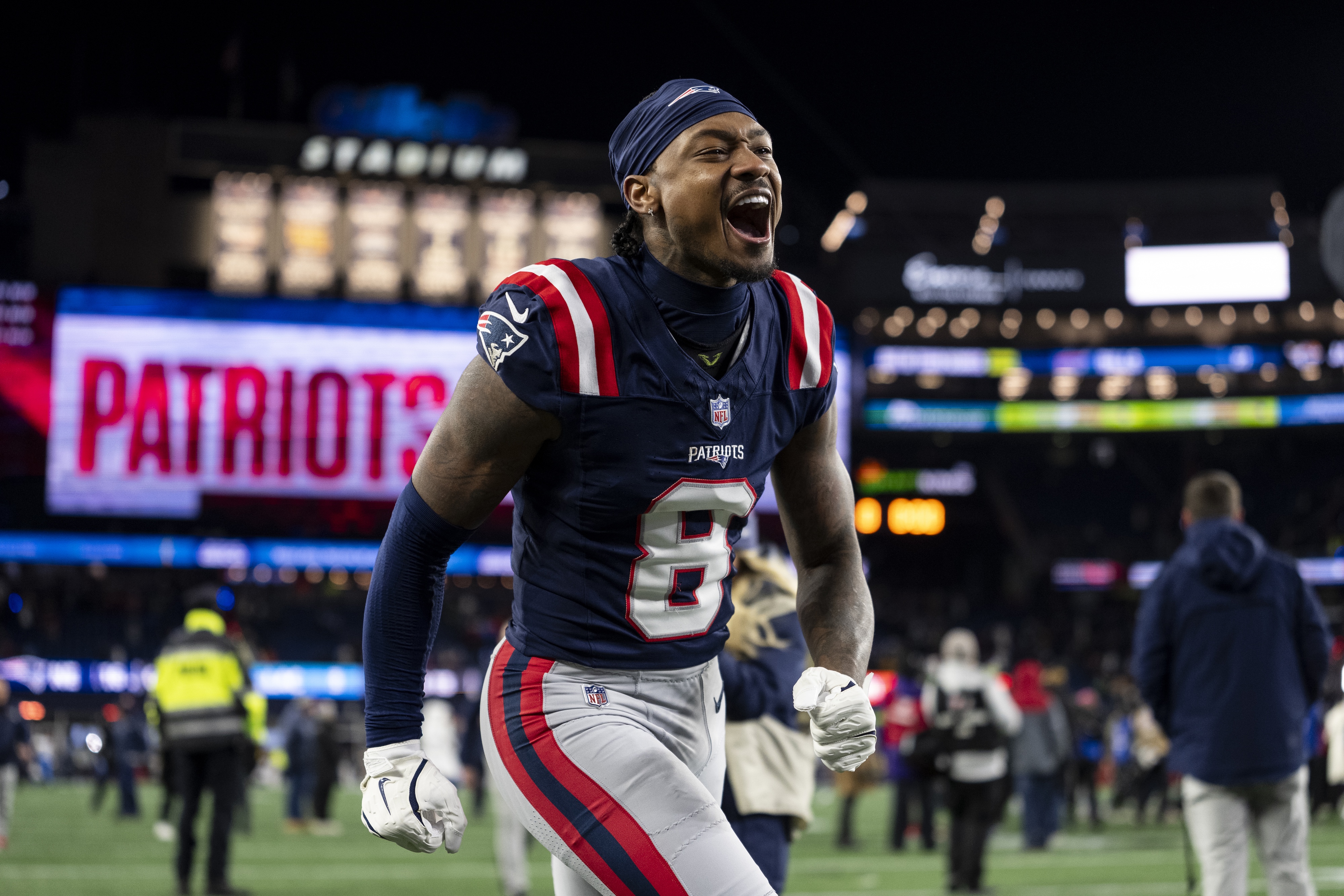 Stefon Diggs runs off the field celebrating the victory. (Michael Owens/Getty Images)