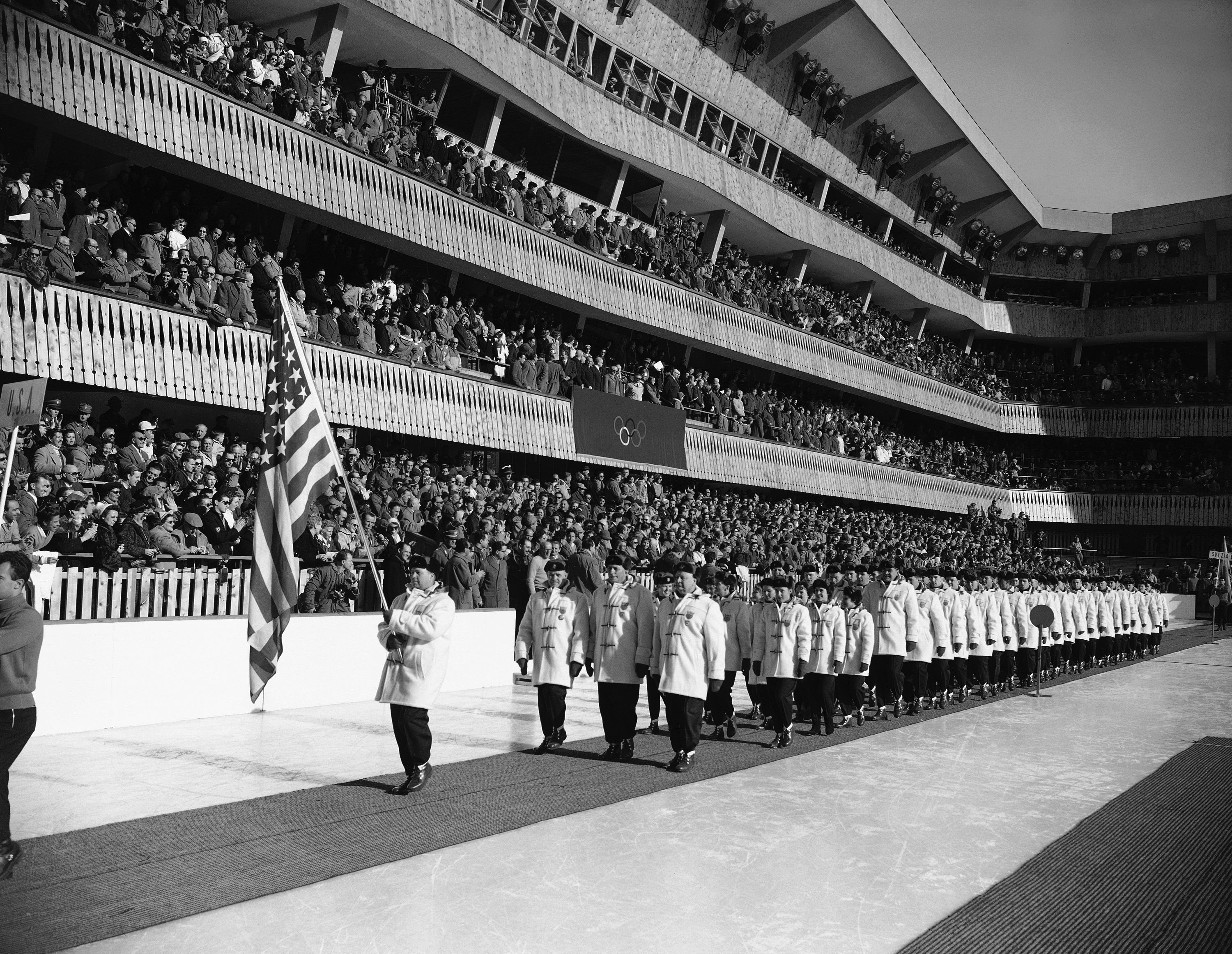 American bobsledder Jim Bickford leads teammates during the Opening Ceremony. (AP Photo)