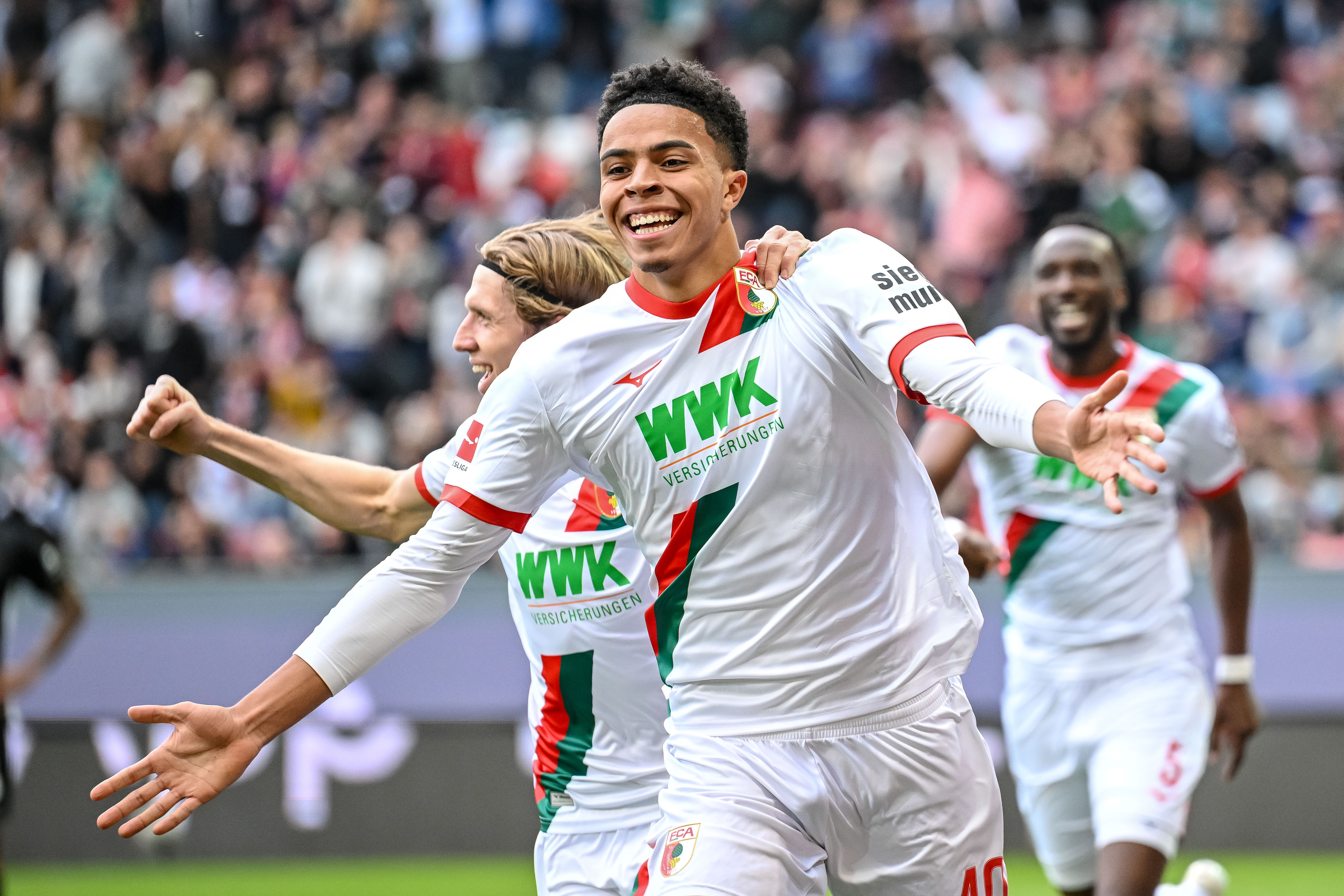 Banks, 19, celebrates after scoring a goal for FC Augsburg. (Harry Langer/picture alliance via Getty Images)