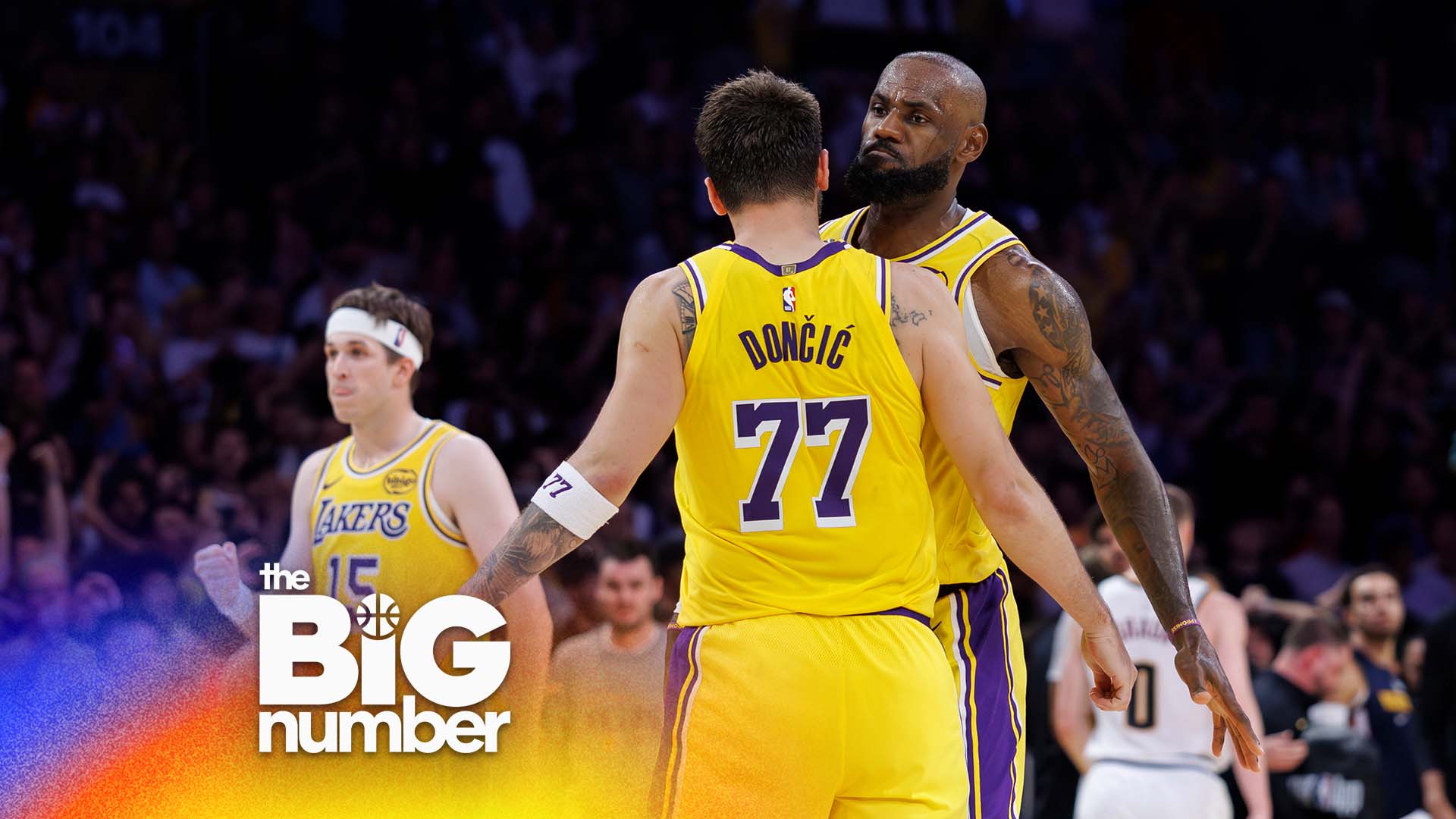 Los Angeles Lakers forward LeBron James and Los Angeles Lakers guard Austin Reaves  react with Los Angeles Lakers guard Luka Doncic after Doncic scored the game-winning basket in overtime against the Denver Nuggets at Crypto.com Arena on March 14, 2026, in Los Angeles, California. (Gina Ferazzi / Los Angeles Times via Getty Images)