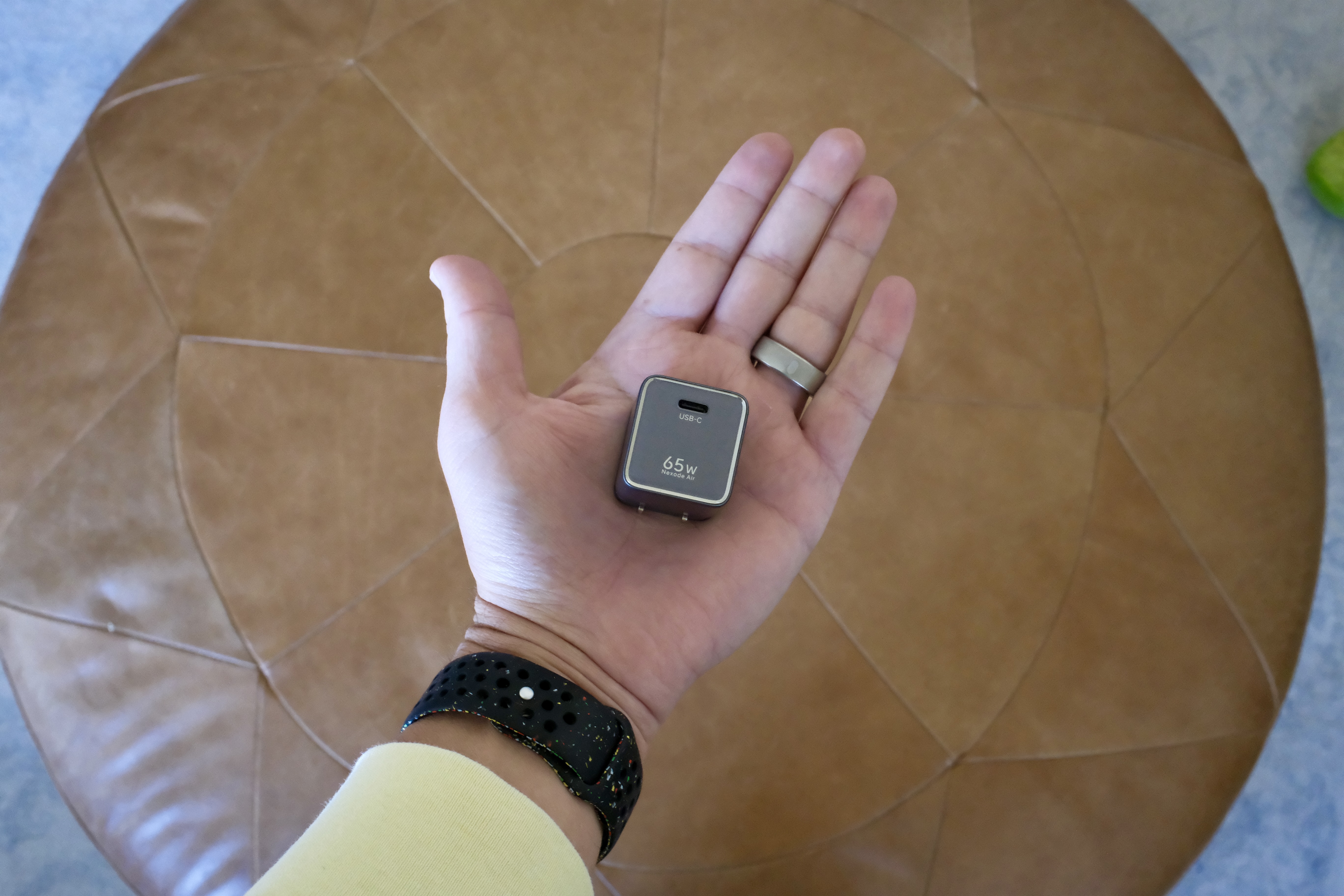 The 65W charger is available in a silver color